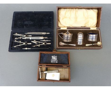 A cased plated cruet set, an Ecobra drawing set and a Wilkinson razor