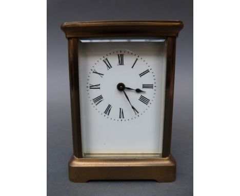 Late 19th/early 20th century French timepiece carriage clock in 'corniche' style brass case, white enamel Roman dial and blue