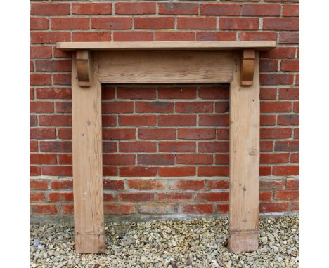 A PINE FIRE SURROUND inside measurement 67cm wide x 92cm high, overall 111cm wide x 113cm high 