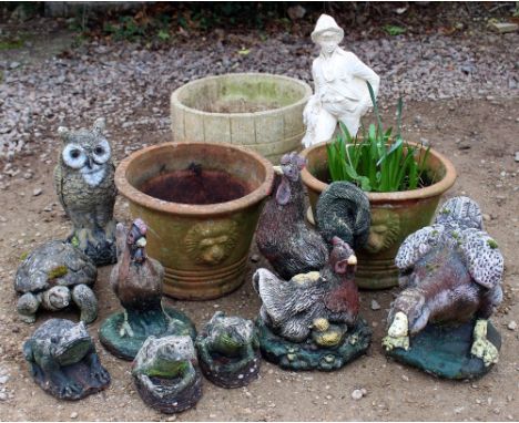 A GROUP OF VARIOUS GARDEN ORNAMENTS to include a pair of terracotta planters with lion mask decoration, a further planter and