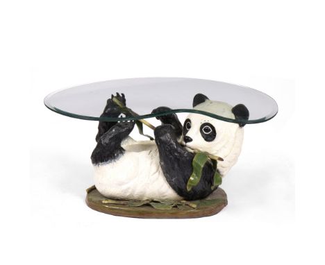 A PAINTED CAST BRONZE 'PANDA' COFFEE TABLE with shaped glass top, 107cm wide x 89.5cm deep x 50cm high