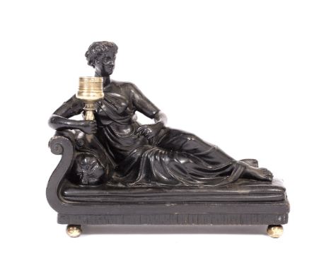 AN EARLY TO MID 19TH CENTURY PLASTER LAMP OR CANDLE STAND IN THE FORM OF A GRECIAN LADY in the manner of Hopper, standing on 