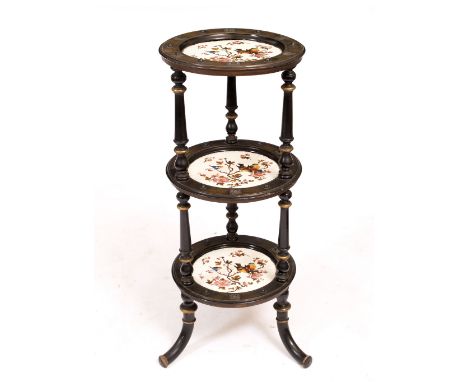 A LATE 19TH / EARLY 20TH CENTURY AESTHETIC MOVEMENT THREE TIER ETAGERE with inset ceramic plates painted with birds sitting o