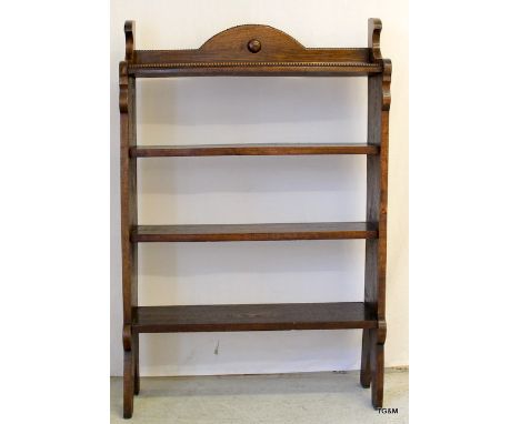 A 4 shelf oak bookshelf 113 x 75 x 27cm