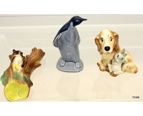 A Poole Pottery Penguin, a Hornsea Dog and a Hornsea owl wall posy hanger
