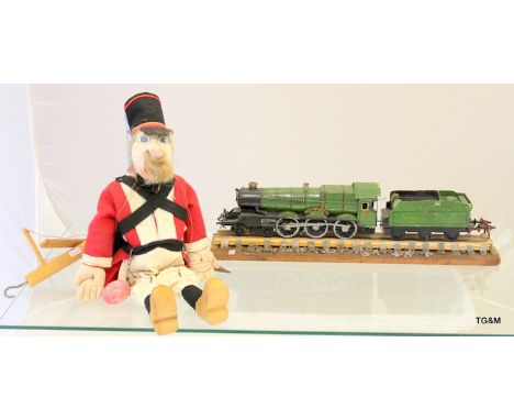 A 1970's wooden puppet and a 1930's wooden train