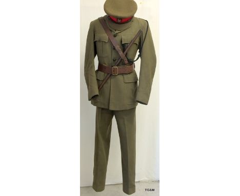 A Lieutenant Colonels uniform from the Queen Victoria’s Rifles consisting of Jacket, Trousers, Cap and Shirt with a brown lea