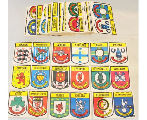 A collection of stick on football badges from 1960's and 70's by Fasprini