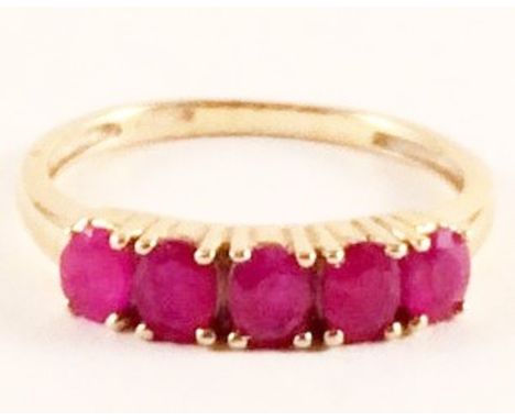 A ladies 9ct gold 5 stone ruby ring size L