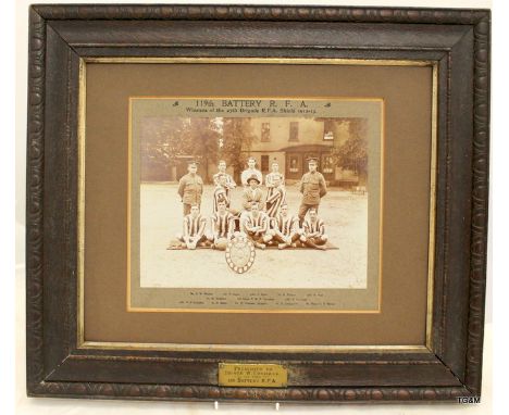 An interesting oak framed photograph from 1913 of the football team for 119th Battery, Royal Field Artillery. To the centre o