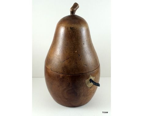 A fruitwood pear shaped tea caddy