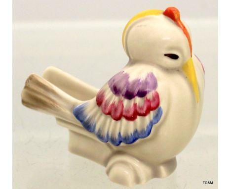 A Clarice Cliff Wilkinson pottery pipe holder in the shape of a bird