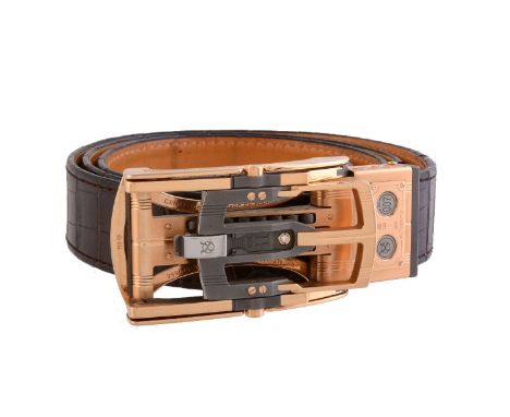 ϒRoland Iten, Calibre R8 Mk II, a gold coloured, steel, titanium and diamond belt buckle, no. 7, with adjustment mechanism, s