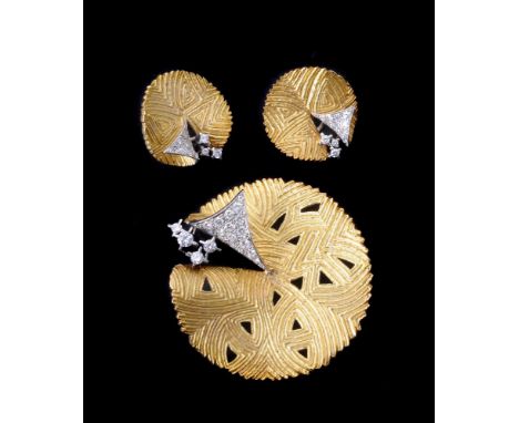 ΩA 1980s abstract brooch and ear clips, the pierced circular brooch with geometric textured ground, with a peeled back triang