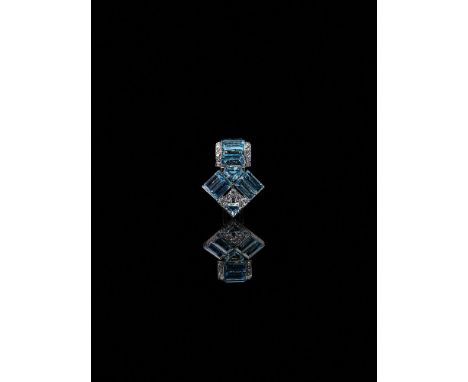 An Art Deco aquamarine and diamond clip by Cartier London, circa 1935, the geometric arrow head shaped clip set with a centra