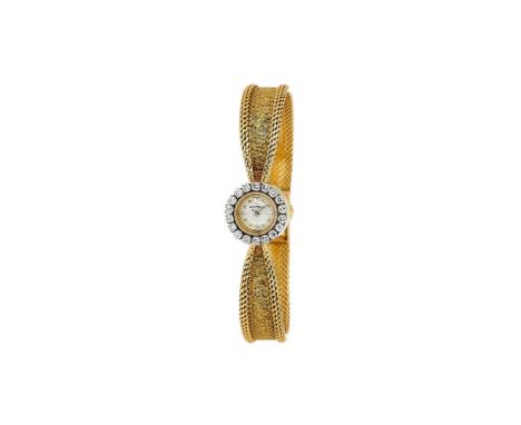 Jaeger LeCoultre, a lady's gold coloured and diamond bracelet watch, no. 846726A, manual wind movement, silvered dial, applie