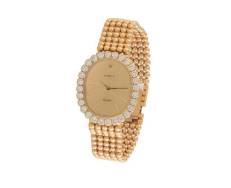 Rolex, Orchid, ref. 2667, a lady's 18 carat gold and diamond bracelet watch, no. R491821, circa 1988, manual wind movement, 1