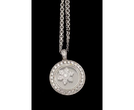 A Happy Diamond Happy Snow Flakes pendant by Chopard, the circular pendant with a diamond set bezel with glazed panels to the