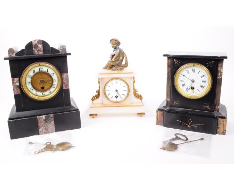 Two Victorian 19th century marble and slate mantel clocks. White enamelled face with ebonised chapter ring. Plinth base with 