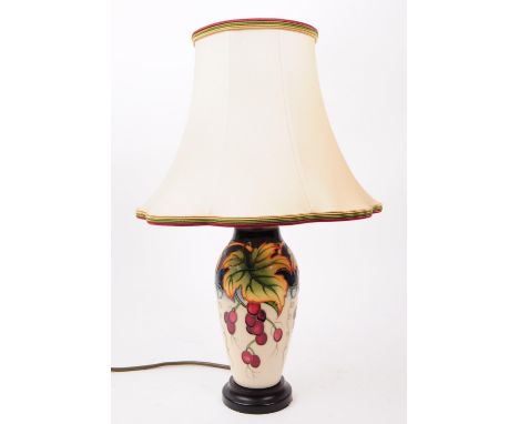 Moorcroft Pottery - a contemporary hand painted ceramic grape &amp; vine leaf desk table lamp light. The lamp of baluster sha