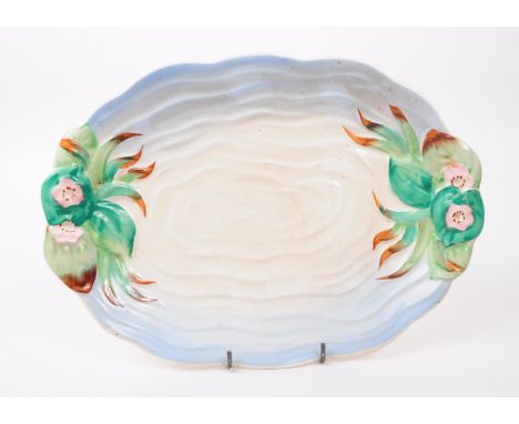 Clarice Cliff, Newport - a vintage mid 20th century circa 1940s hand painted ceramic pottery ' pond ' plate/ The plate decora