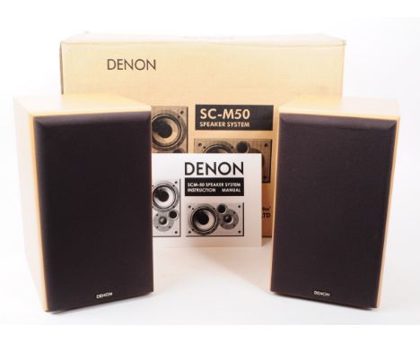Denon - A Denon SC-M50 bookshelf speaker system. The system in original box. 