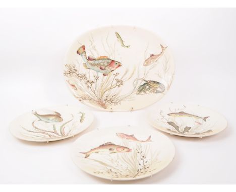 A collection of four vintage 20th century Johnson Bros ' Fish ' hand painted ceramic serving dinner plates. The lot to includ