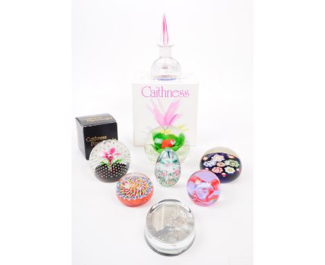 Caithness, Scotland - A collection of late 20th century glass paperweights. To include flower in the rain, flower, Daphne Pai