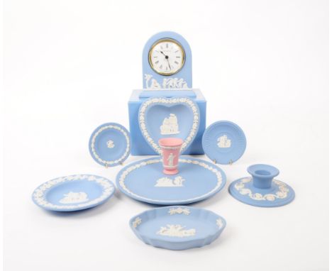 Wedgwood - Jasperware - A collection of porcelain table ware pieces. In the traditional light blue bisque porcelain with the 