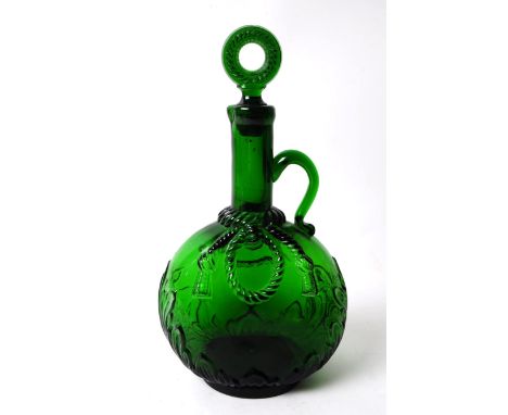 Victorian 19th century green glass wine decanter with stopper. Of ovoid form with foliate relief to side, swagger banner deco