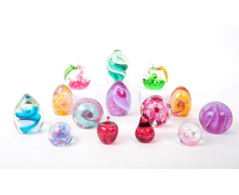 A collection of vintage 20th century glass paperweights. Including, Caithness - Cinderella, Mooncrystal, Swish, Langham and o