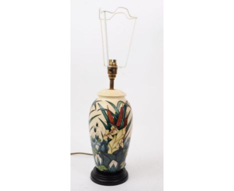 Moorcroft Pottery - a hand painted ceramic ' Bullrush ' design desk table lamp light. The lamp without shae. Raised on wooden