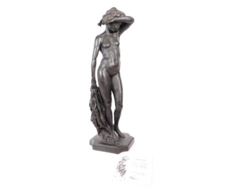 Ron Moll - A contemporary bronze cold cast resin figure. The figure in the form of a nude woman with arm held over forehead. 
