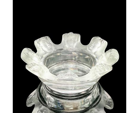 A vintage clear tobacciana tray with faces on the frosted rim. Lalique France etched on the base. Dimensions: 4.25"W x 1.25"H