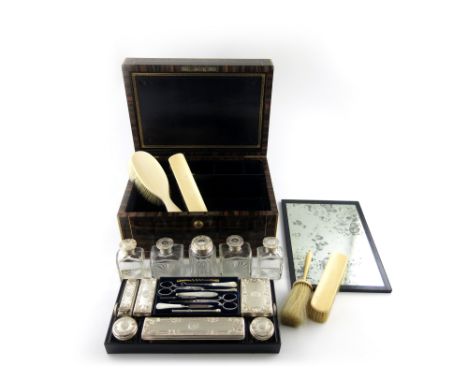λA Victorian silver travelling dressing table set, by John Harris, London 1853, retailed by Edwards, 21 King Street, Bloomsbu