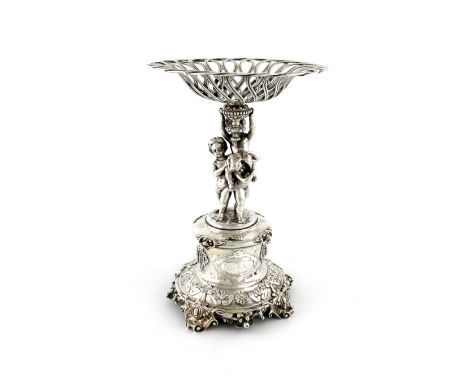 A Victorian silver epergne, by Charles and George Fox, London 1860, the stem modelled as three playful putti, holding a pierc