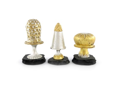 By Christopher Lawrence, three modern parcel-gilt silver surprise mushrooms, London 1981, no. 133/250, London 1982, no. 124/2