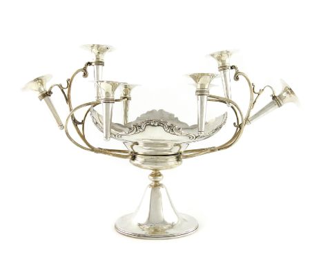 An Edwardian silver epergne, by Thomas Latham & Ernest Morton, Chester 1906, central detachable oval bowl, foliate scroll bor