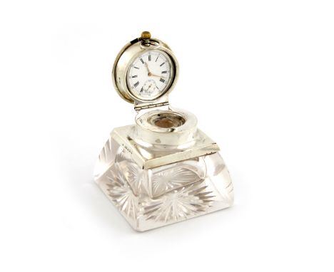 An Edwardian silver-mounted glass watch inkwell, by H. Matthews, Birmingham 1908, tapering square body, the plain hinged cove