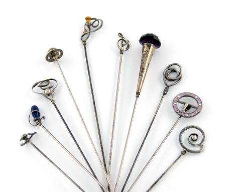 A collection of ten Charles Horner silver hat pins, comprising: one of buckle form, Chester 1912, with pink enamel decoration