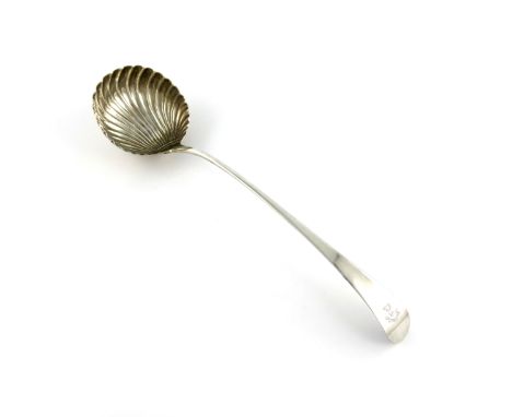 A George III silver Old English pattern soup ladle, by Hester Bateman, London 1779, shell shaped bowl, gilded interior, the t