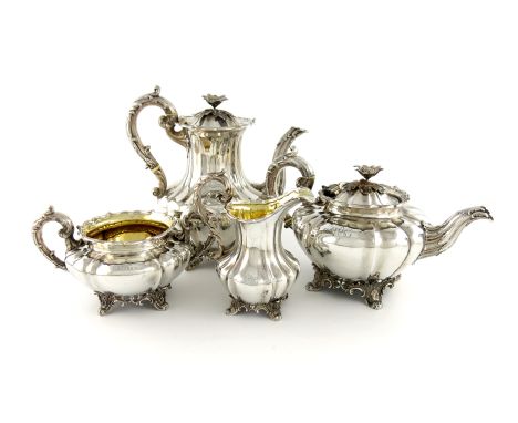 λλA William IV silver four-piece tea set, by the Barnards, London 1835/36, lobed circular bellied form, leaf capped scroll ha