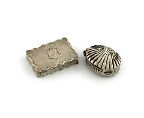 A George III silver vinaigrette, by Joseph Willmore, Birmingham 1807, oval form, fluted shell hinged cover and base, pierced 
