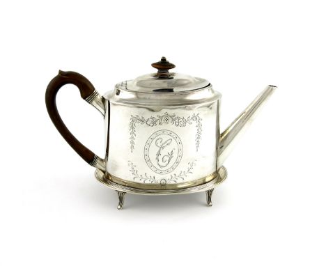 A George III silver teapot and matching stand, the teapot by Peter and Ann Bateman, London 1792, the stand by Peter and Jonat