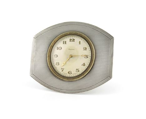 A silver travelling clock, by A. Buckley Limited, Birmingham 1927, rounded rectangular form, engine-turned decoration, plated