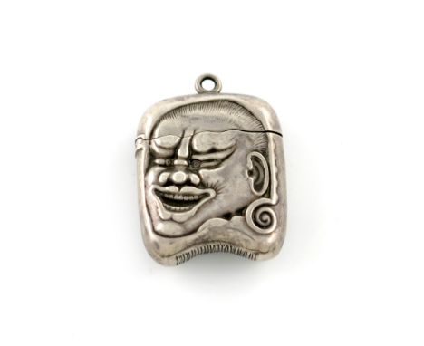 A late 19th century American silver vesta case, by Gorham, shaped rectangular form, modelled as a stylised caricature of an o