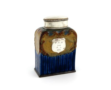 A late-Victorian silver-mounted Doulton tea caddy, the mounts by Saunders and Shepherd, Chester 1896, retailed by Zimmerman, 