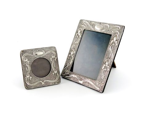 An Edwardian Art Nouveau silver photograph frame, by W J Myatt & Co, Birmingham 1904, rectangular form, with sinuous foliate 