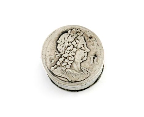A George I silver patch box, probably by John Albright, London circa 1720, circular form, the hinged cover stamped with a por