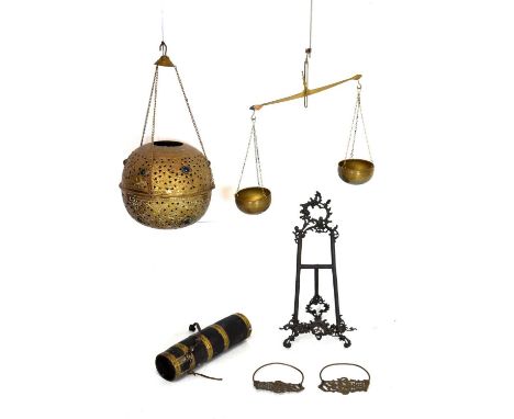 Assorted metalware to include an Eastern pierced ball ornament, table easel, scales, etc., 50cm high and smaller